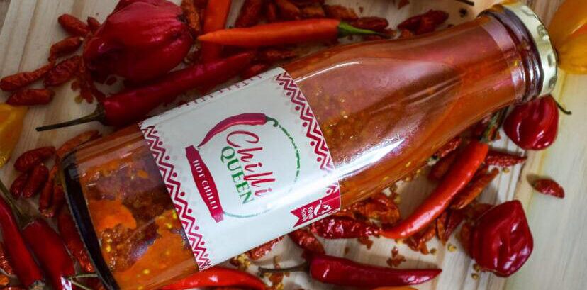 A bottle of Chilli Queen sauce