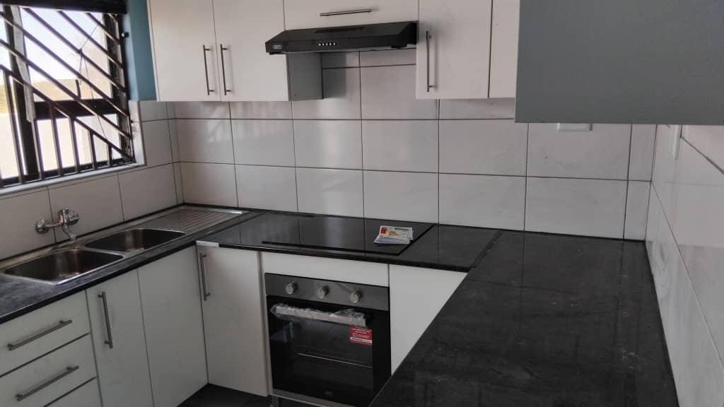 A fitted kitchen in a completed Ekuku house